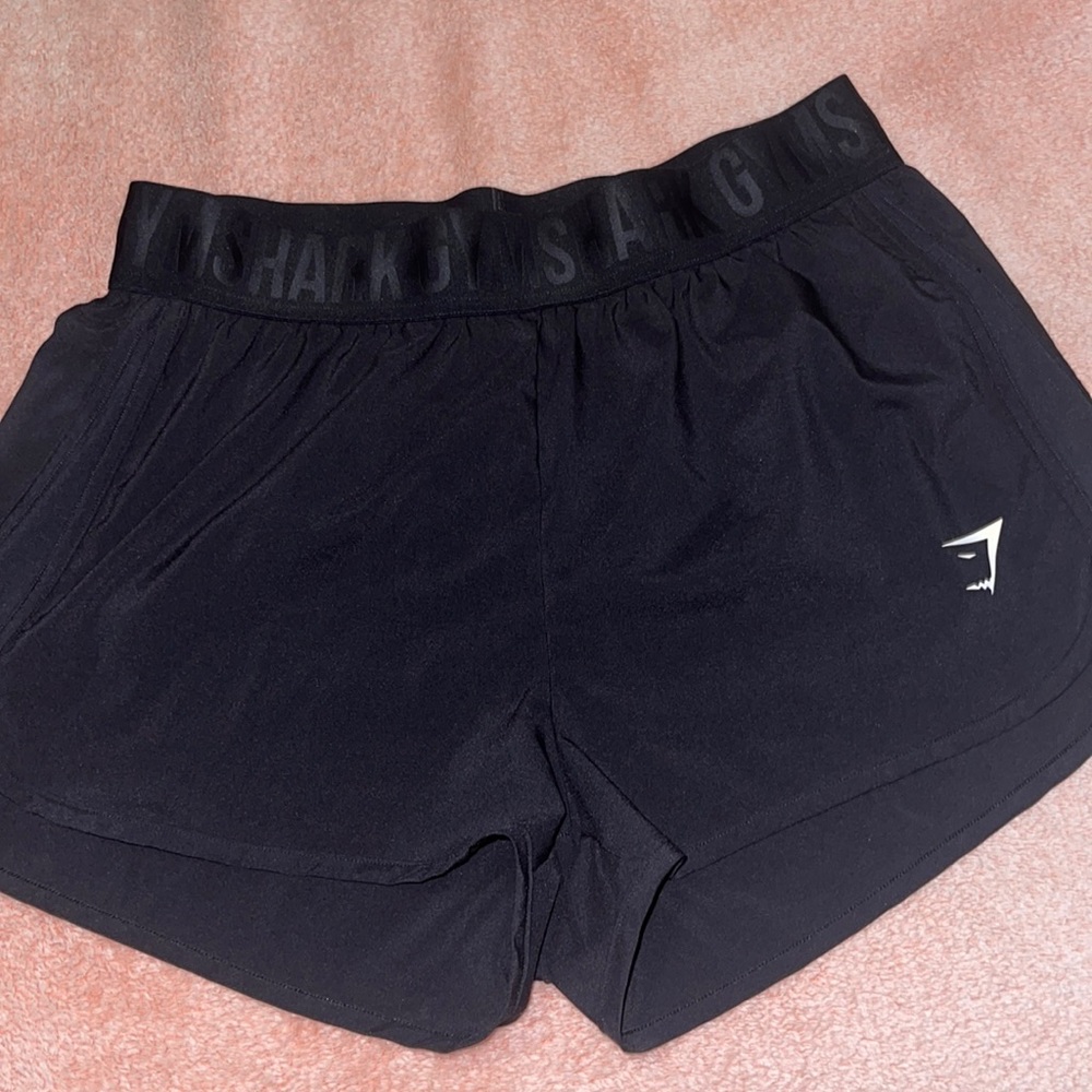 Sport shorts, the brand is gymshark, is size medium, black color